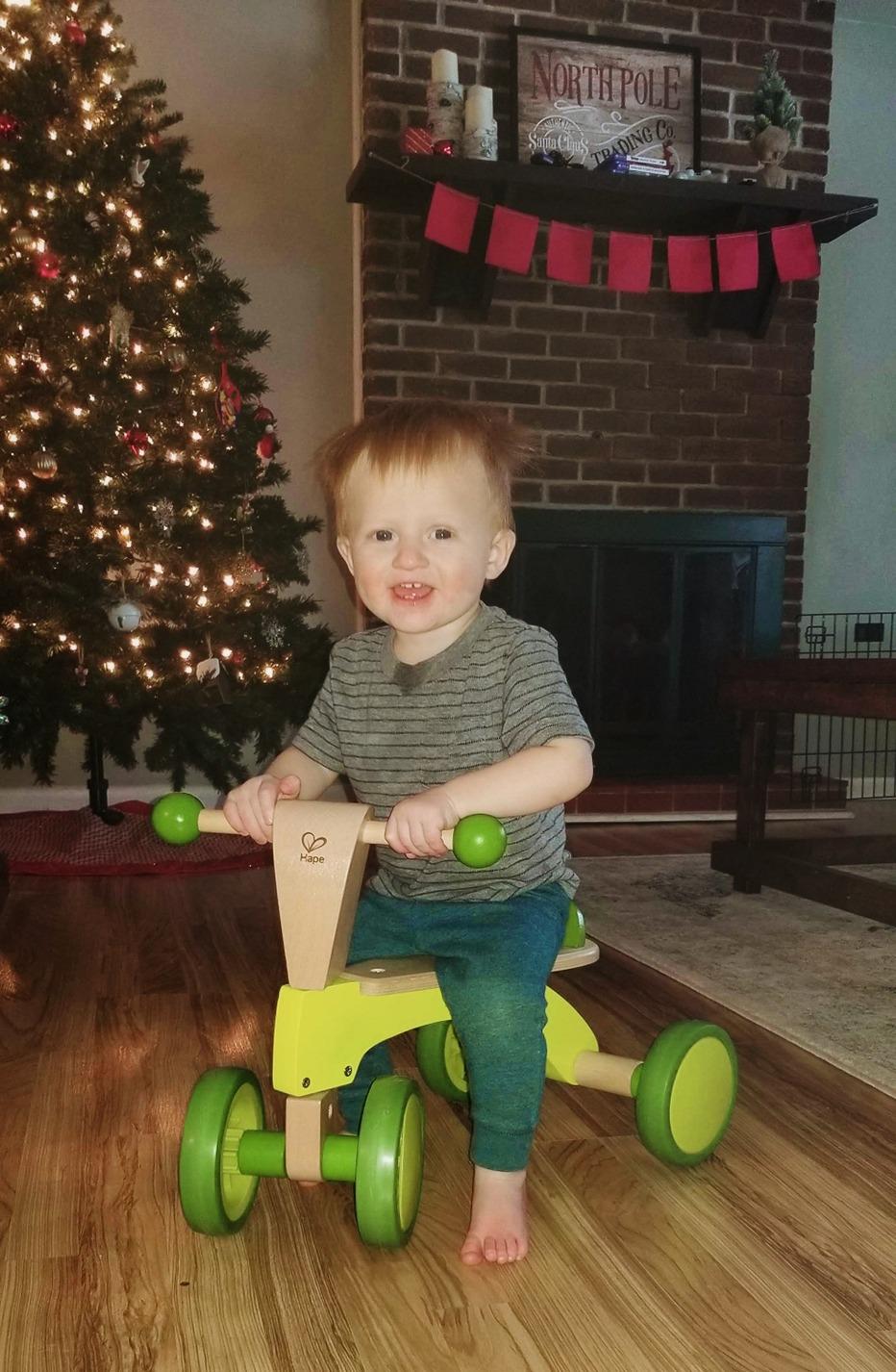 Hape Scoot Around Ride On Wood Bike | Award Winning Four Wheeled Wooden Push Balance Bike Toy for Toddlers with Rubberized Wheels, Bright Green customer photo 2