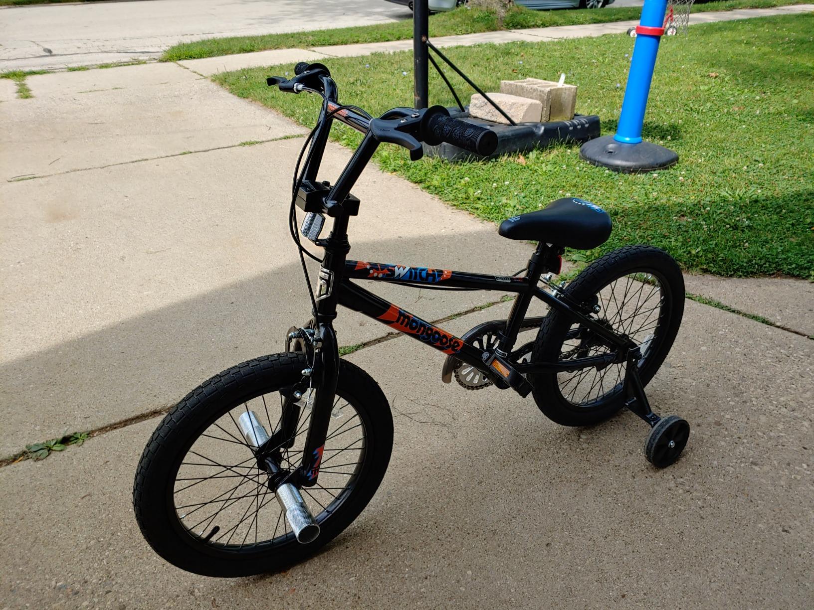 Mongoose Switch Freestyle BMX Kids Bike, Mag Wheels, Small Stand-Over Steel Frame, Chain Guard, Foot Brake, Boys and Girls 5 - 7 Years Old, 18-Inch Wheels, Black customer photo 2