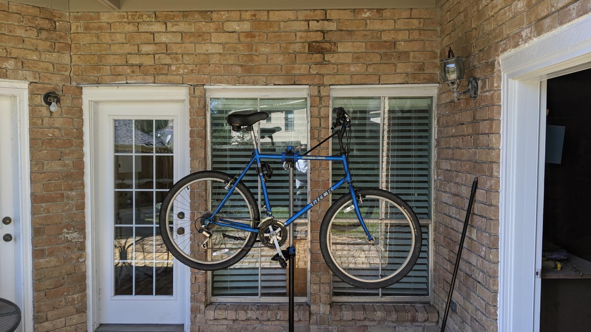 Topeakmart Bicycle Repair Stands Height Adjustable Foldable Rack with Clamp | Steel frame raises bikes to a back-saving height, secures bikes up to 66 lb, and folds down flat with a handy tool tray. customer photo 1