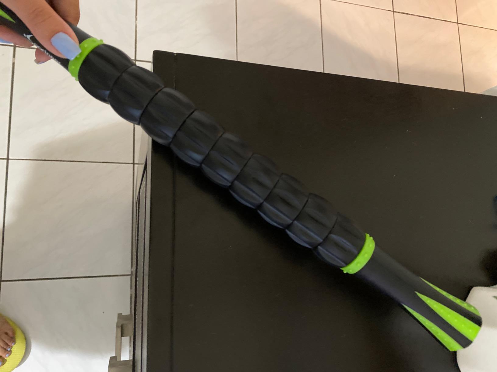 Sportneer Muscle Roller Stick - Massage Stick for Athletes - Reducing Soreness and Muscle Strain, Soothing Legs Cramps - Physical Therapy & Body Recovery - Black Green customer photo 1