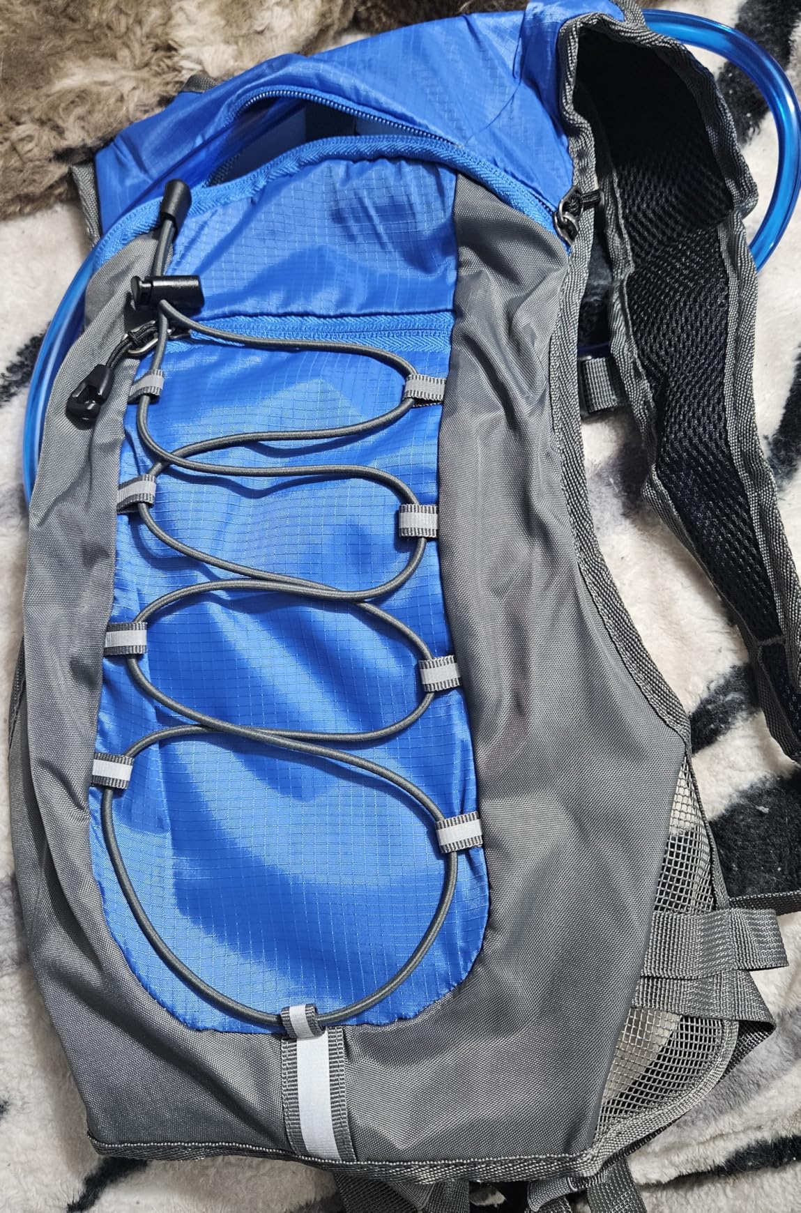 Unigear Hydration Pack Backpack with 70 oz 2L Water Bladder for Running, Hiking, Cycling, Climbing, Camping, Biking customer photo 1