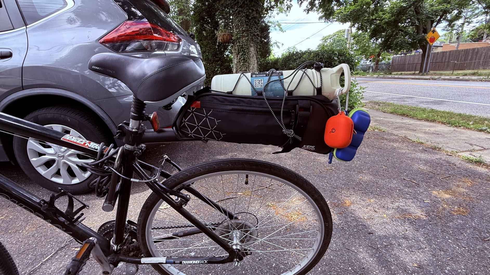 KEMIMOTO Rear Bike Rack Bag - 8L PVC Water Resistant Ebike Bags for Bicycle | Bicycle Trunk Pannier for Commuter Travel Shopping and Cycling Accessories, Reflective Strips, Lightweight (Black) customer photo 1