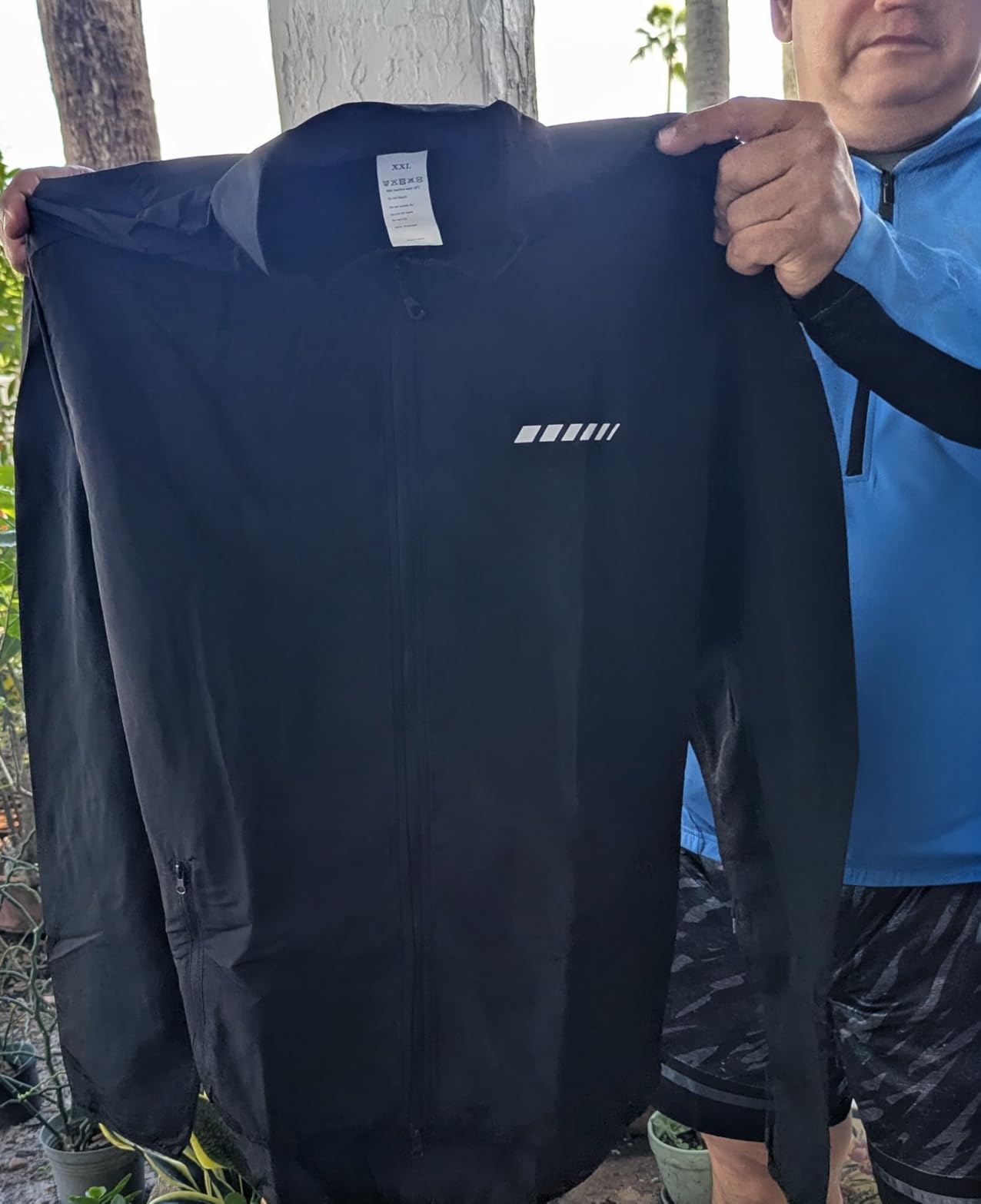 qualidyne Men's Lightweight Cycling Windbreaker Jacket, Windproof, Water-Resistant (Light Rain), Reflective, 2 Zip Pockets customer photo 1