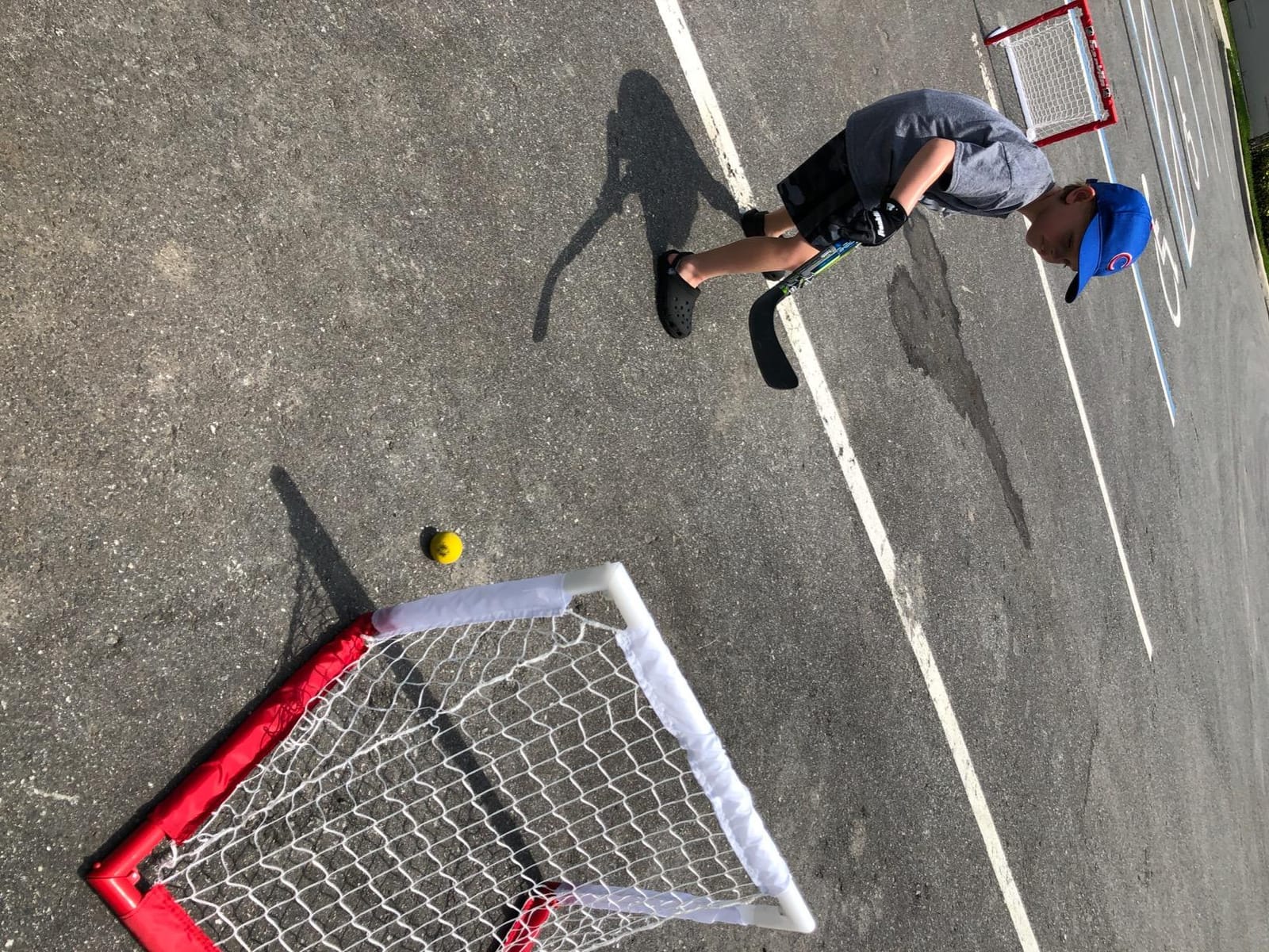 Franklin Sports - NHL Kids Folding Hockey Goals Set - (2) Street Hockey & Knee Hockey Goals - (2) Adjustable Youth Hockey Sticks, (2) Knee Hockey Sticks, (2) Mini Hockey Balls + (1) Street Hockey Ball customer photo 2