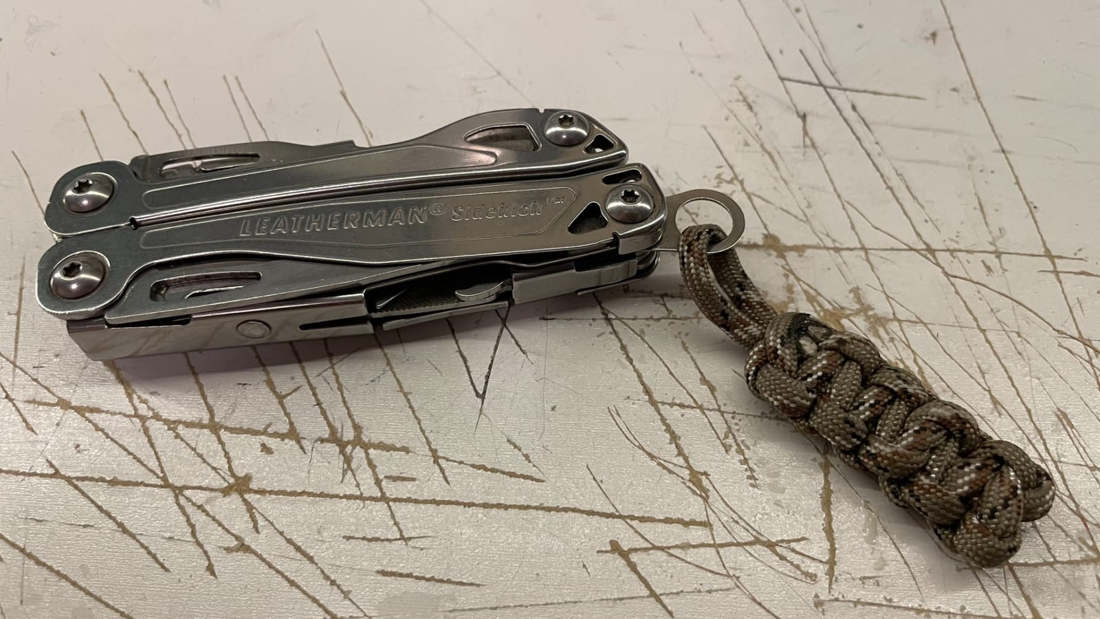 LEATHERMAN Sidekick Pocket Size Multitool with Spring-Action Pliers and Saw, Stainless Steel customer photo 2