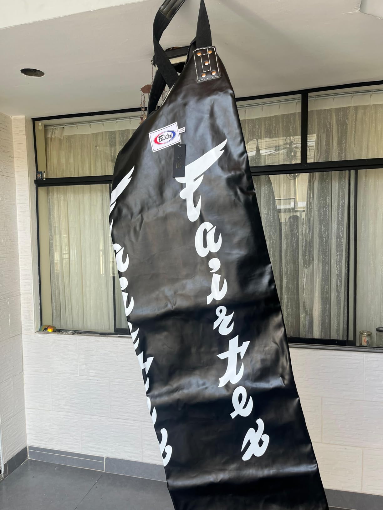 Fairtex HB6 Banana Heavy Bag, Muay Thai MMA Kickboxing Boxing Punching Bag | Full-length synthetic hide with non-tear lining. Extended cylinder absorbs low calf sweeps, front pushes, and knees customer photo 1