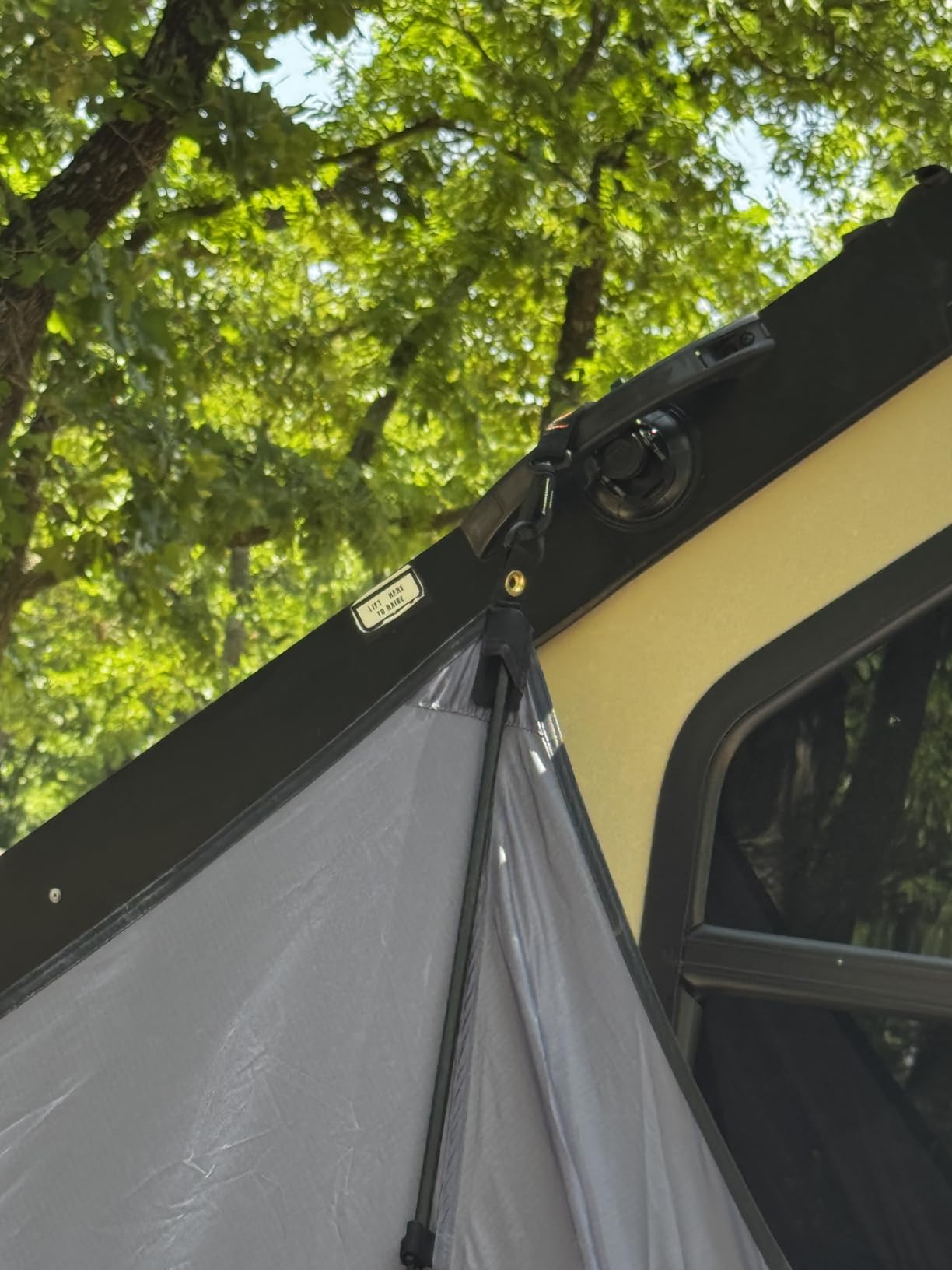 Hasika Waterproof SUV Tailgate Tent and Car Awning | Universal fit for SUVs Vans RV Trailer. Features heavy-duty suction cups, adjustable poles, and 76 sq ft of waterproof shade customer photo 2