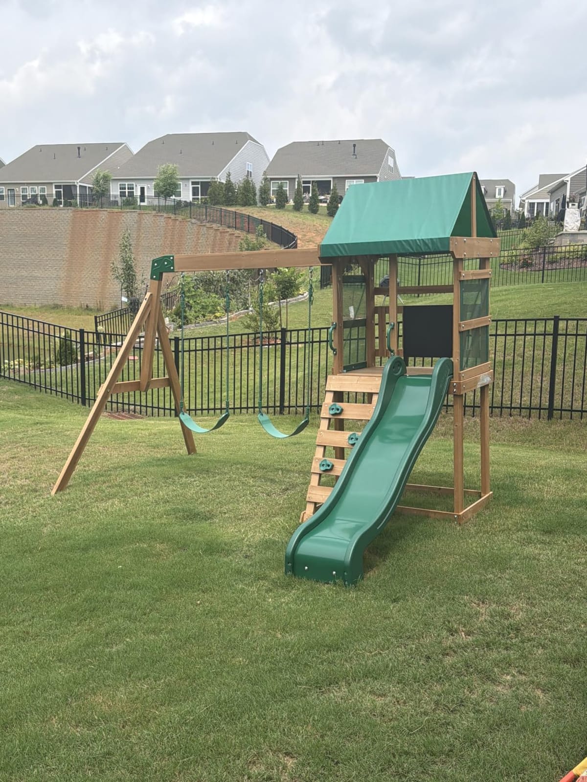 Backyard Discovery Buckley Hill Cedar Wood Swing Set with Wave Slide, Play Deck, Rock Wall Ladder, Belt Swings, Chalkboard, Canopy Roof, Outdoor Playset customer photo 2