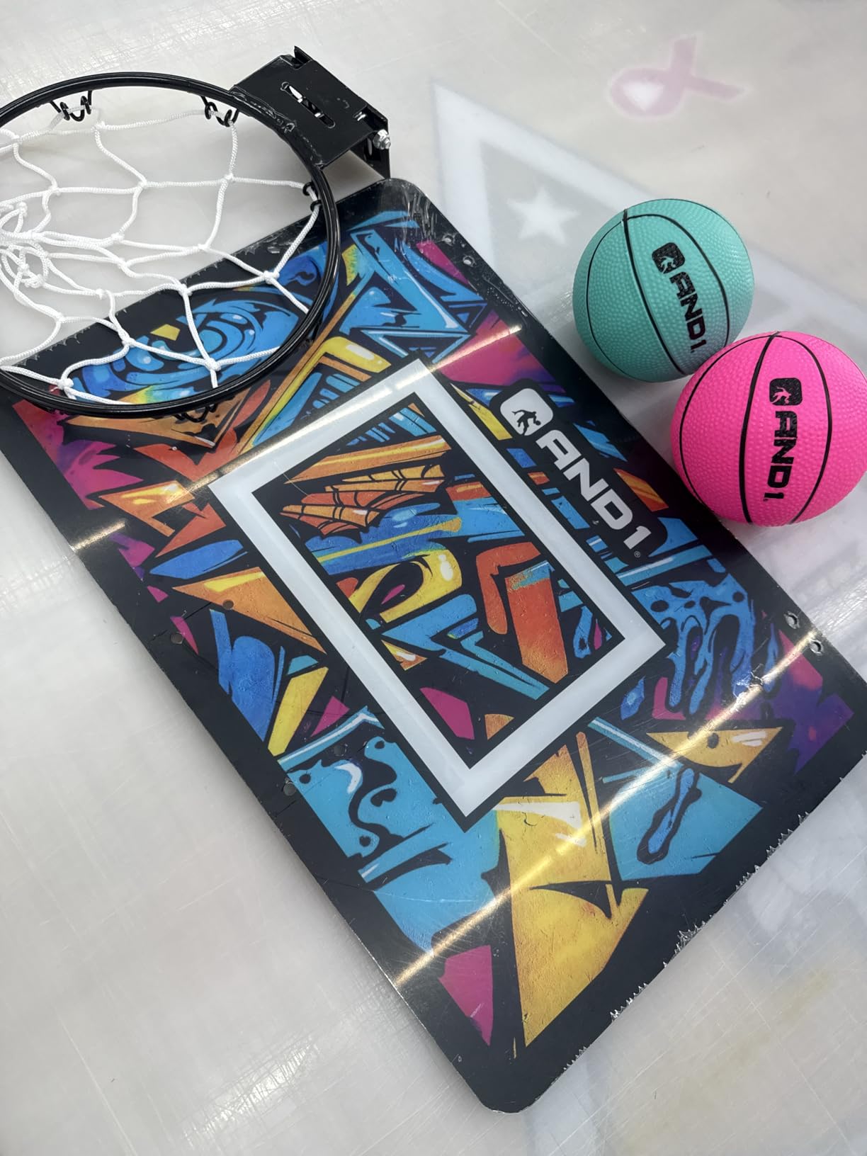 AND1 Over the Door Mini Basketball Hoop: 18x12 Shatterproof Backboard, 2 Mini Basketballs, and Hand Pump Included customer photo 1