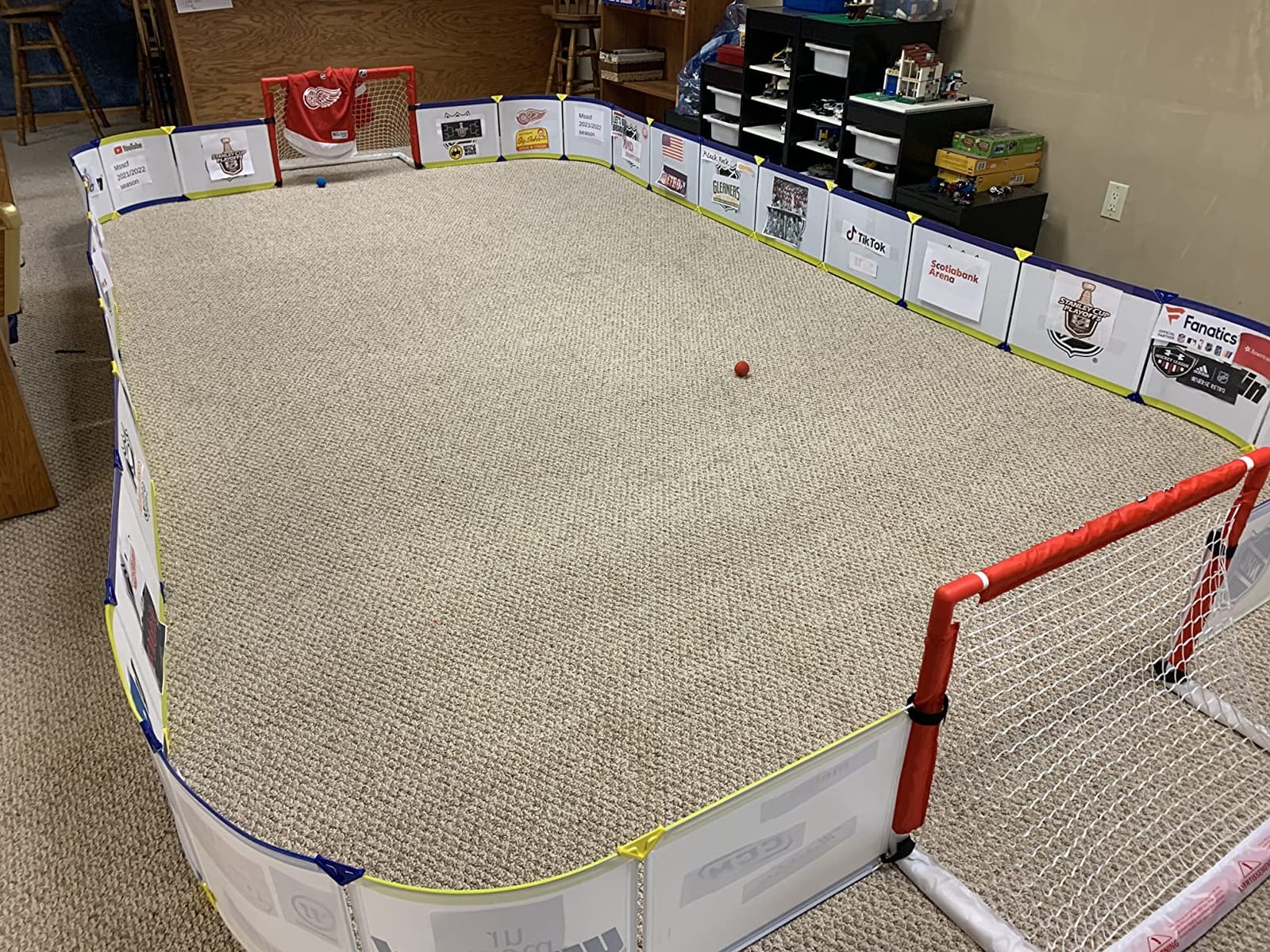 Franklin Sports Mini Hockey Rink Set - Half Rink Knee Hockey Goal, Mini Sticks, and Ball Set - Indoor Mini Hockey Rink - Official NHL Licensed customer photo 1