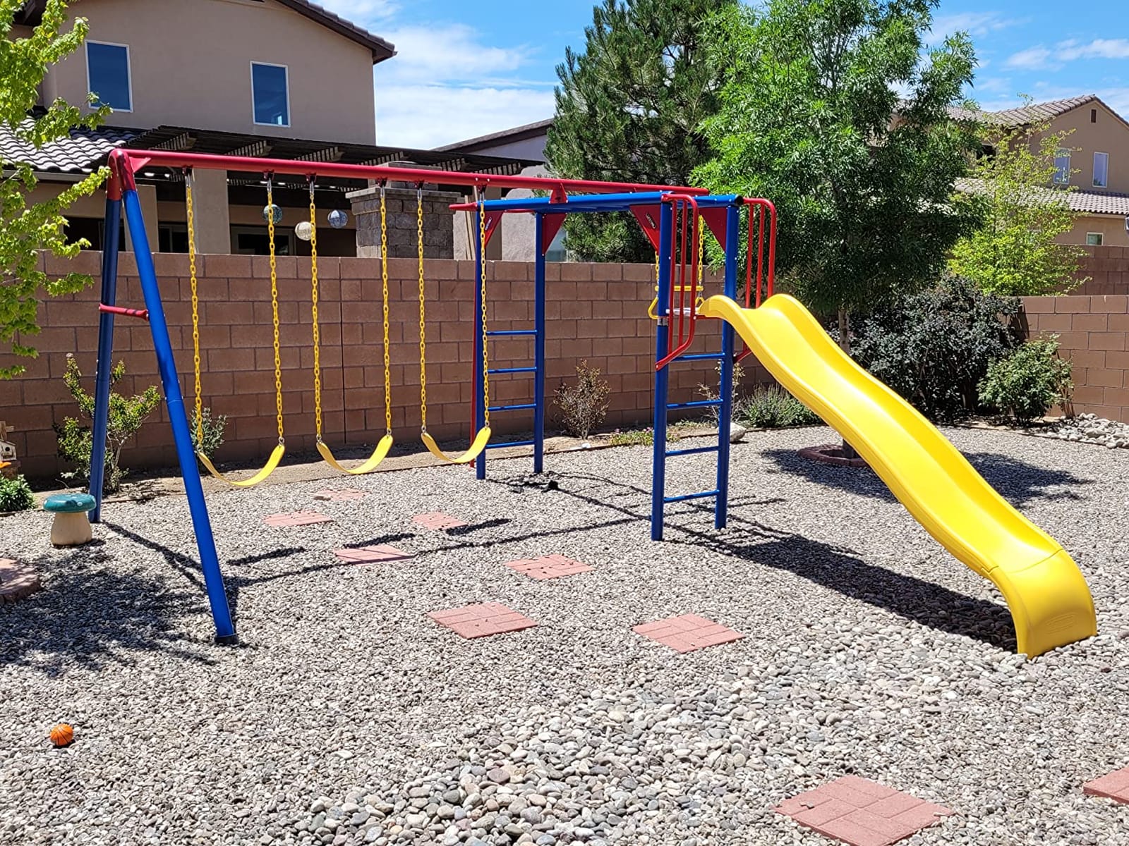 Lifetime 91028 Monkey Bar Adventure Swing Set with 3 Swings, Trapeze Bar, 9-Foot Slide and Fireman's Pole, Earthtone customer photo 1