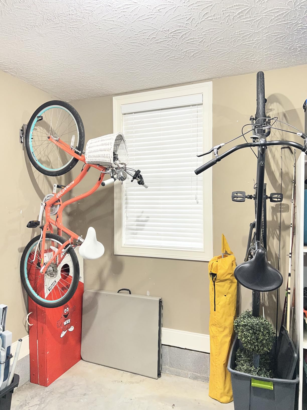 StoreYourBoard Swivel Bike Wall Mount, Vertical Rack for Garage | Swivel Bike Rack, Rubber Coated Hook, Multiple Position Lock, Holds 50 lb, Fits All Tires Up To 2.6 in customer photo 1