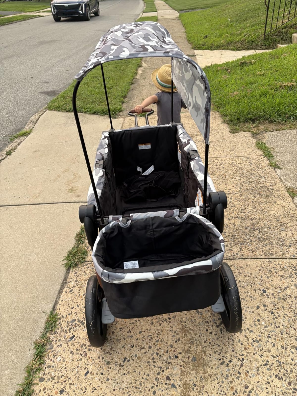 ELEMARA All-Terrain Stroller Wagon for 2 Kids, Foldable Kids Wagon Stroller Includes Removable Canopy,Mosquito net, Adjustable Push&Pull Handle, Snack Tray & Cup Holders, Storage Basket, Grey+Black customer photo 2