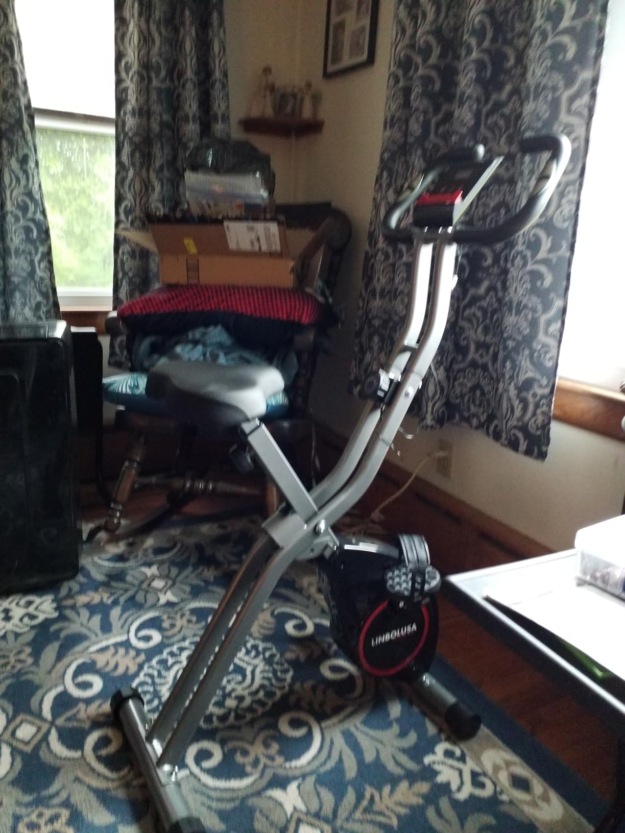 Foldable Exercise Bike for Home Workouts, Compact Stationary Bike with 16-Level Resistance and Quiet Riding, Featuring Adjustable Seat, LCD Display, Heart Rate Tracking and 300lb Weight Capacity customer photo 1