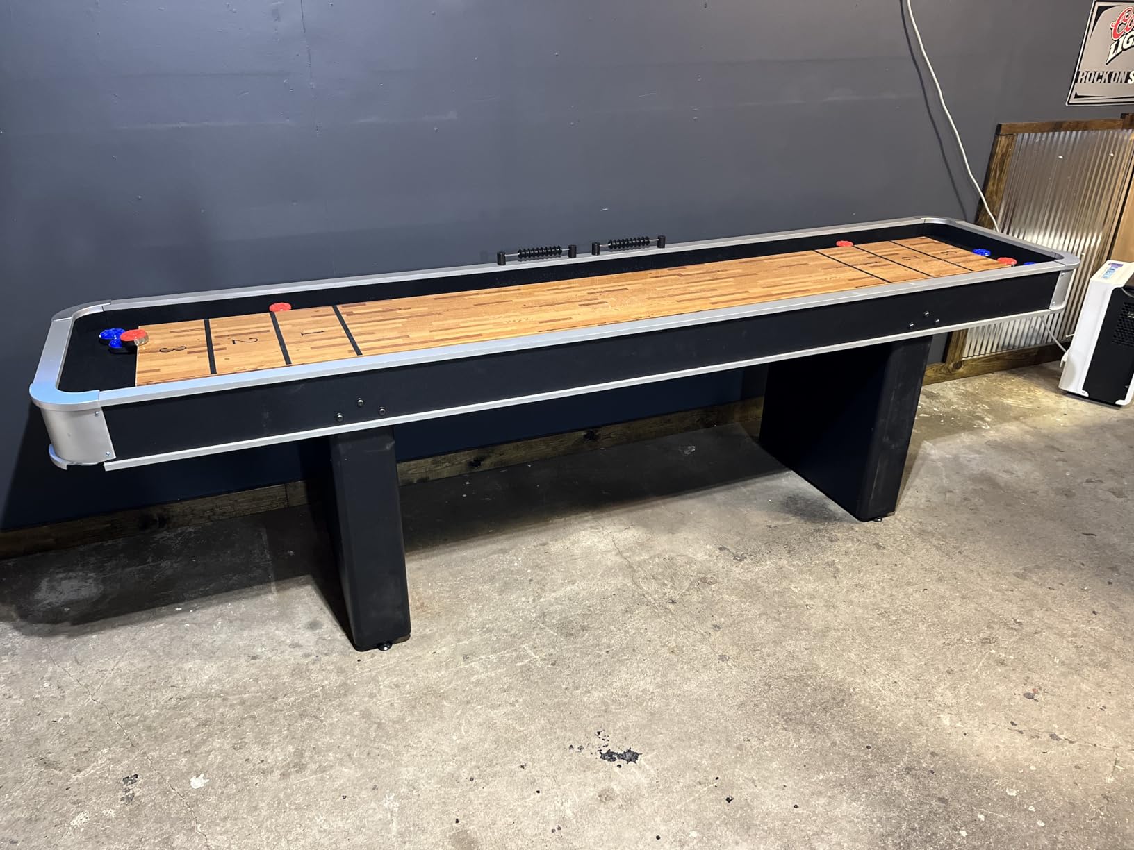 Atomic 9’ LED Shuffleboard Tables with Poly-Coated Playing Surface for Smooth, Fast Puck Action and Pedestal Legs with Levelers for Optimum Stability and Level Play customer photo 2