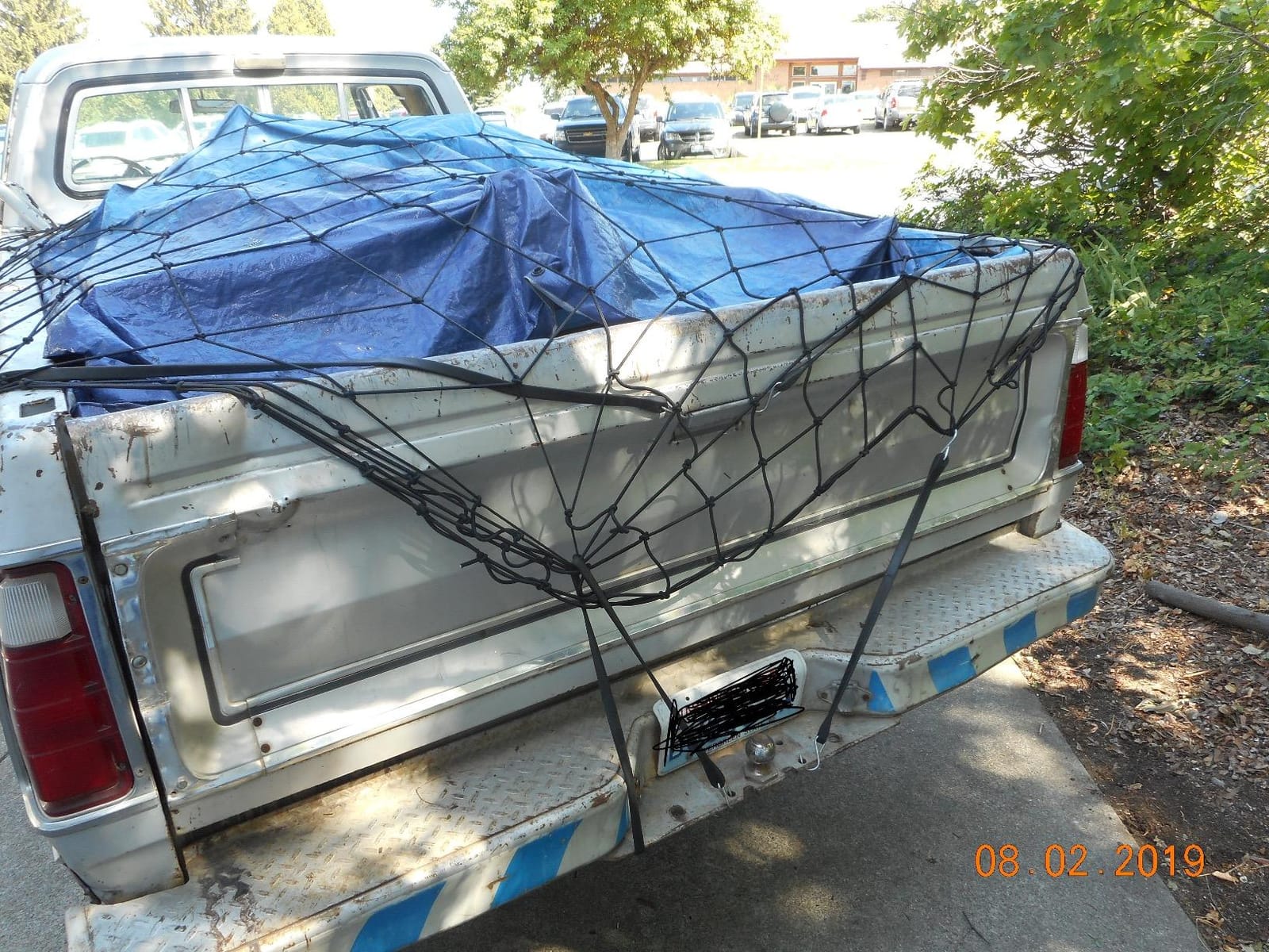 Truck Bed Cargo Net – 4 x 6 Foot, Heavy-Duty Elastic Mesh with 12 Black Clips and Storage Bag for Pickup for Cargo Netting, Securing Loads in Trailers, SUVs & Roof Racks customer photo 1