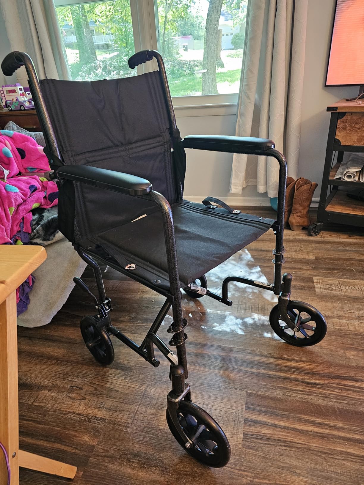 Medline Durable Folding Steel Transport Wheelchair with Swing-Away Footrests, 19-Inch Seat Width, Black Frame, Black Upholstery customer photo 2