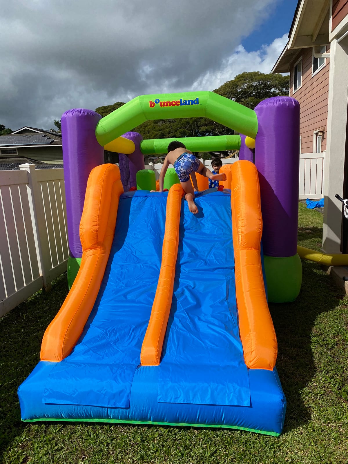 Bounceland Pro Racer Obstacle Bounce House with Dual Slides, Bounce, Climb, Slide All in One, UL 1 HP Blower Included, 19 ft x 9 ft x 7 ft H, Great for Big Party, Fun Racing Game in Teams customer photo 1