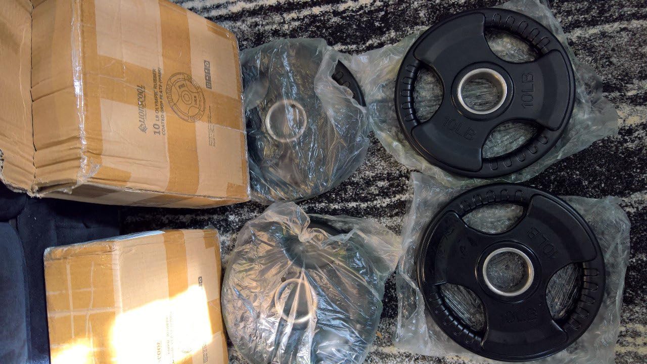 LIONSCOOL 2-Inch Olympic Rubber Grip Weight Plates, Cast Iron, 2.5-45 LB customer photo 2