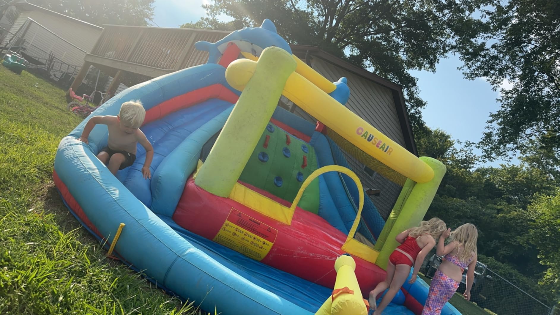 Causeair Inflatable Water Slide with Bounce House,Dolphin Styling,Splashing Pool,Double Water Cannon,Climbing Wall,Heavy Duty Air Blower,Inflatable Water Park Slide for Kids Backyard Summer customer photo 1