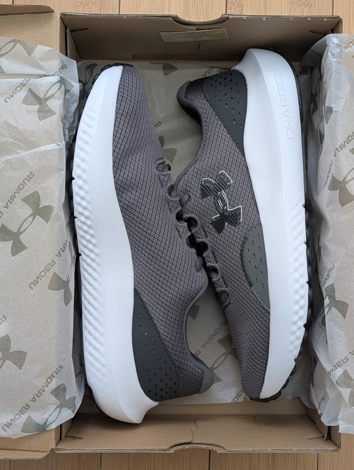 Under Armour Men's Charged Surge 4 Sneaker customer photo 1