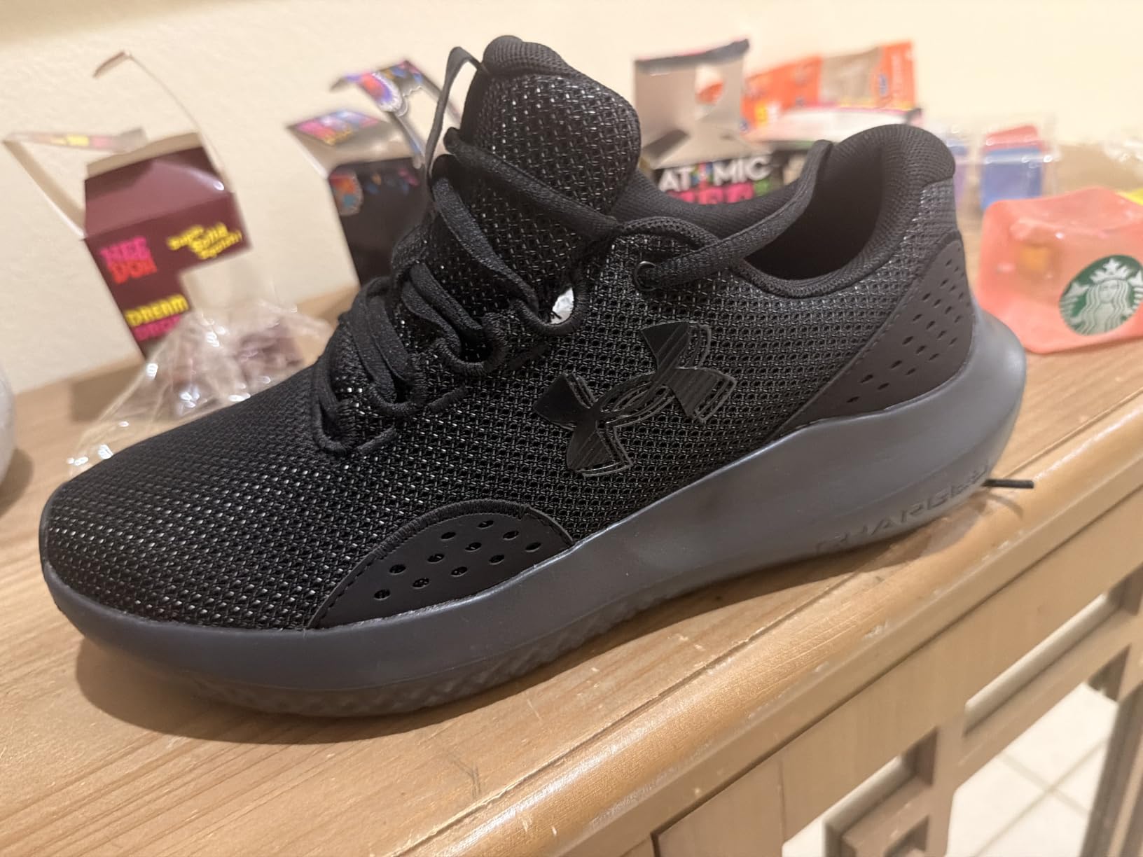 Under Armour Men's Charged Surge 4 Sneaker customer photo 2