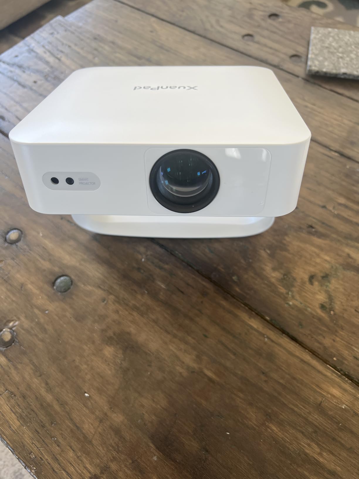 [Officially-Licensed App & Auto Focus]White Smart Mini Projector with WiFi and Bluetooth, XuanPad 4K Support Movie Projector, Portable Native 1080P Outdoor Projector with 360° Stand customer photo 1